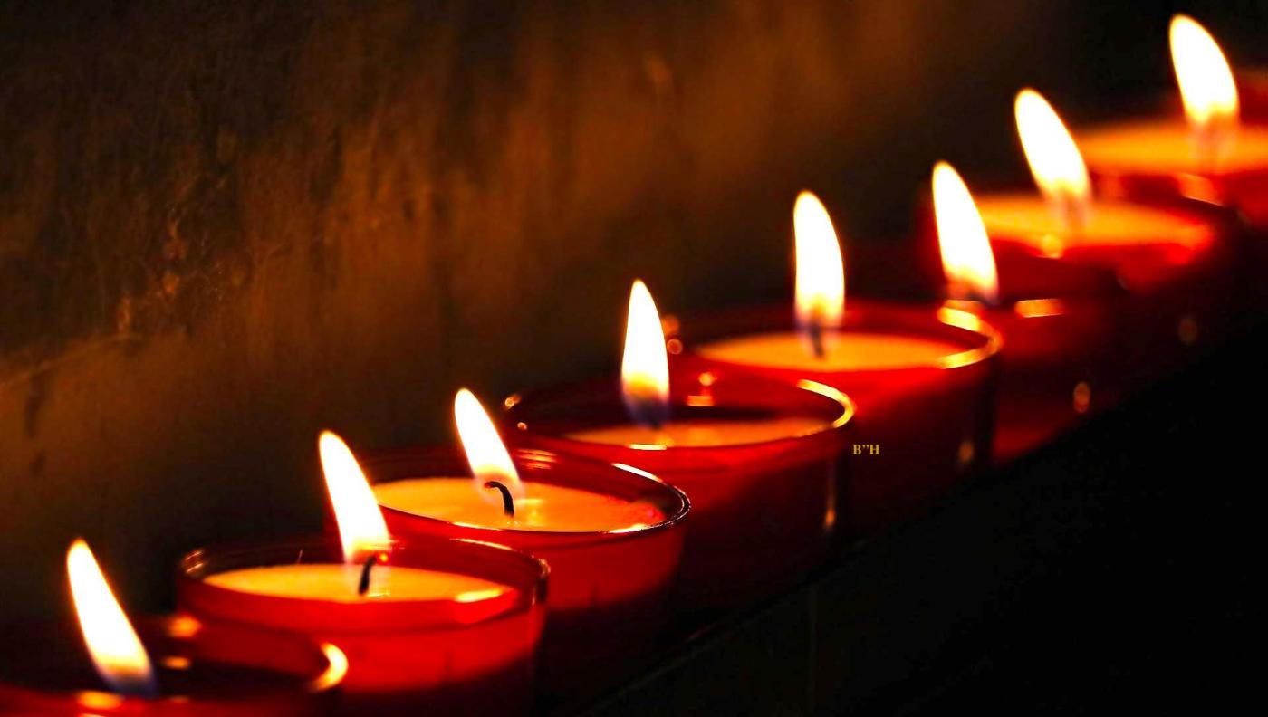 line of memorial candles remembering children who died