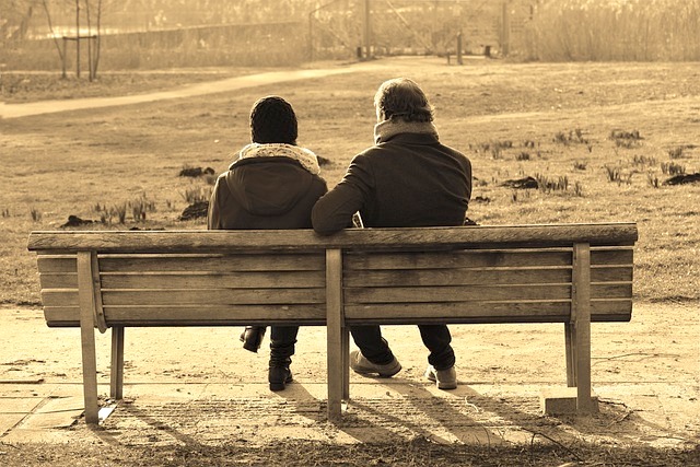 people talking on bench