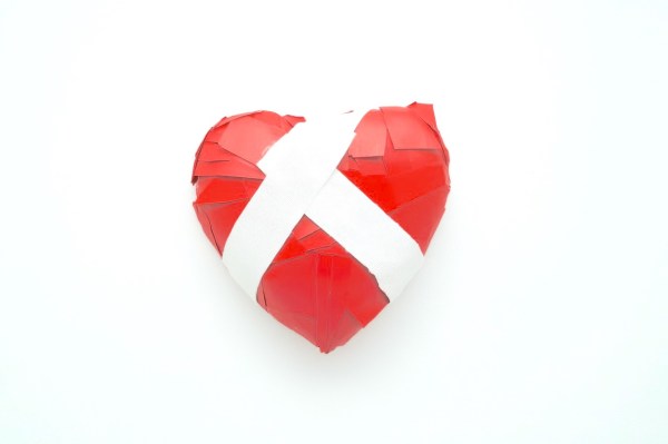 how can you mend a broken heart after child loss, a taped heart