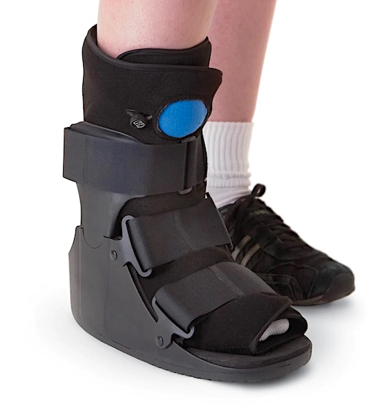 After foot surgery, I can't really walk well in this boot. Can't get to the cemetery. Taking a Break from Grief After Losing a Child